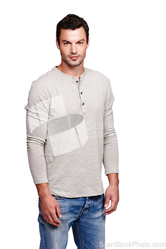 Image of Portrait, face and man in studio isolated on a white background looking serious in casual clothes. Pride, cool and modern model male posing for trendy style with space for advertising and motivation