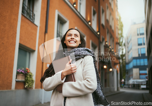 Image of Travel, tourist and book with a sightseeing woman in the city traveling for tourism or vacation. Thinking, journal and traveling with a young female overseas or abroad for holiday in an urban town