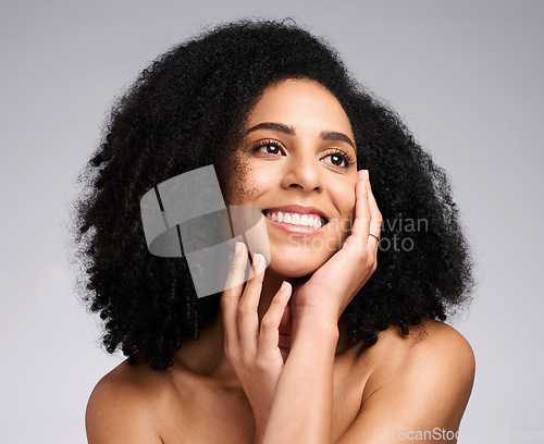 Image of Black woman, beauty and skincare face portrait with a smile, glow and happiness for clean skin on studio background. Aesthetic model with afro hair and dermatology, cosmetic and makeup facial results