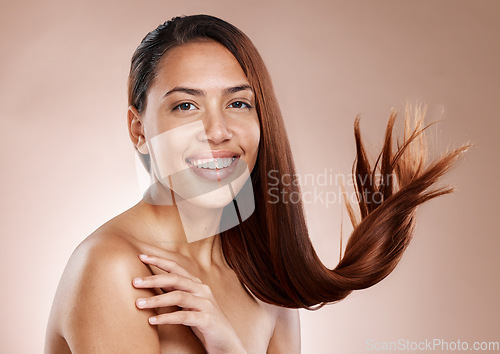 Image of Face portrait, beauty and hair care of woman in studio on a brown background. Skincare, makeup cosmetics and happy female model satisfied after salon treatment for healthy growth, texture or balayage