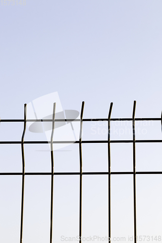 Image of metal grate, sky