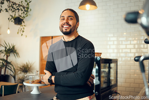 Image of Coffee shop owner, portrait and small business barista standing with proud smile from job. Restaurant, happy person and man with arms crossed ready for waiter work or staff management with happiness