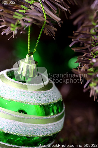 Image of Christmas ornaments on tree.