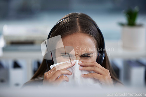 Image of Sick, tissue and call center woman employee working and blowing nose at a telemarketing job. Customer support, b2b sales worker and contact us business person with virus or allergy at the office