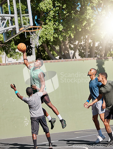 Image of Basketball court, team sports and black people together for fitness, ball game and workout outdoor. Men, friends and community training for sport competition with teamwork, motivation and energy