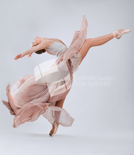 Image of .Ballet, dance and woman with creative freedom isolated on a white background in a studio. Art, training and ballerina dancer dancing with elegance, class and beauty in a room with a backdrop.