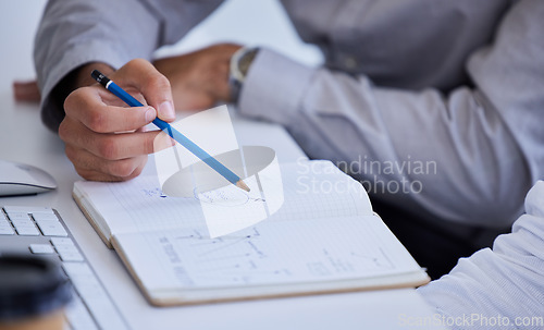 Image of Businessman hands, book and notes at desk for coaching, learning and teaching for planning together with man. Corporate men, pencil and notebook with strategy, collaboration and teamwork in office