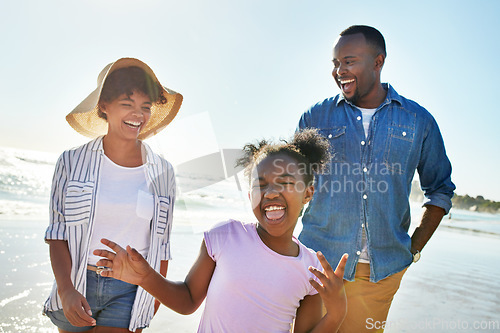 Image of Beach, parents and portrait of African girl on holiday with a peace sign, crazy and funny in Australia. Comic, goofy and happy black family walking by the ocean to relax, travel and smile on vacation