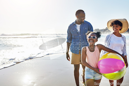 Image of Black family, kids or beach with a mother, father and daughter carrying a ball while walking on the sand by the sea. Love, nature and ocean with a man, woman and girl child on the coast in summer