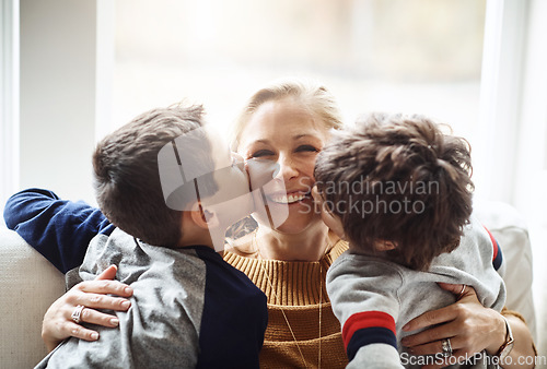 Image of Kiss, happy and portrait of a mother with children for love, relax and bonding in a family home. Hug, smile and mom with affection for boy kids during quality time on the living room sofa of a house