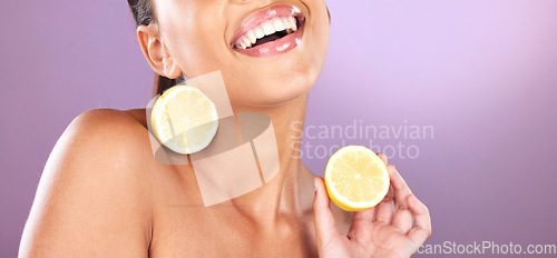 Image of Woman, face skincare or lemon product on purple studio background for organic dermatology, healthcare diet wellness or self care grooming. Zoom, smile or happy beauty model and fruit facial cosmetics