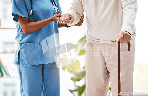 Image of Nurse, disability and old man with walking stick in nursing home for osteoporosis, rehabilitation and cancer. Cane, disabled patient and support for physiotherapy with caregiver, healthcare and hands