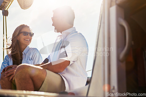 Image of Couple sailing on yacht, summer and travel with vacation at sea, love and commitment with lens flare, sun and happiness. Man, woman and relationship, marriage and honeymoon in Italy with holiday