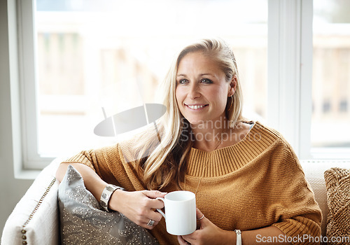 Image of Woman, thinking and relax happy with tea on sofa in living room for morning mindfulness peace, calm vision and planning lifestyle ideas in home. Female, smile and mindset thought with coffee on couch