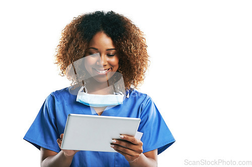 Image of Doctor, black woman and tablet for typing in studio with smile, focus and web communication by white background. Isolated nurse, touchscreen tech or reading on social media app, medical news or chat
