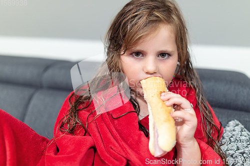 Image of happy cute little girl with curly golden hair