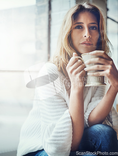 Image of Coffee, portrait and woman relax in home with delicious cup of caffeine, espresso or cappuccino. Peace, tea and female with mug beverage sitting by window while enjoying quality time alone in house.