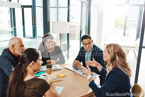 Image of Company vision and mission of business people in meeting at corporate workplace together. Collaboration, brainstorming and strategy of focused interracial employees in business meeting.