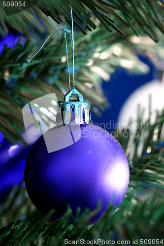 Image of Christmas ornaments on tree.