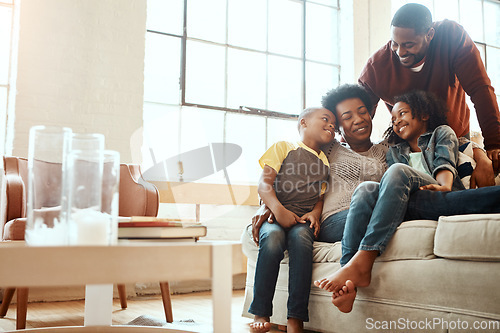 Image of Love, black family and playful in living room, couch and bonding for quality time, loving and break. Mother, father and children on sofa in lounge, happiness and smile on weekend, playing and relax