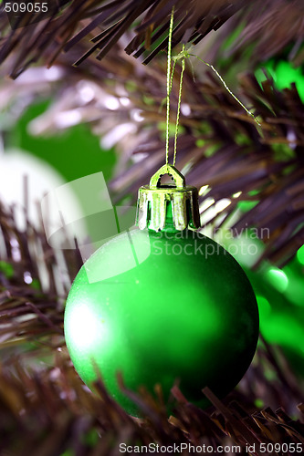 Image of Christmas ornaments on tree.