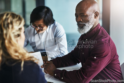 Image of Strategy, data analysis or black man in business meeting, investment review or planning company finance. Collaboration, thinking CEO or teamwork on tax data analytics or global financial network