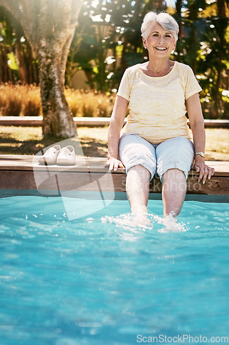 Image of Relax, senior woman and feet pool in happy portrait with smile and fun time on retirement holiday. Summer, sun and old lady with legs in water, retired and smiling on luxury vacation at spa in Cancun