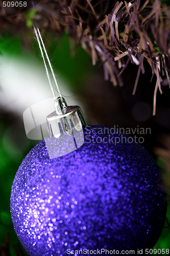 Image of Christmas ornaments on tree.
