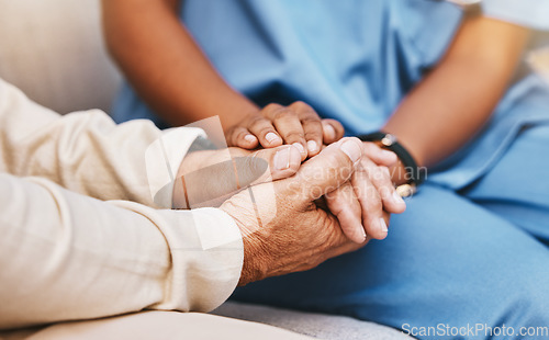 Image of Nurse, patient and holding hands in nursing home for healthcare, empathy and support in depression, anxiety and psychology. Medical counseling, therapy and caregiver with hope, advice and counseling