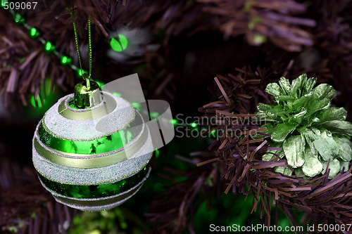 Image of Christmas ornaments on tree.