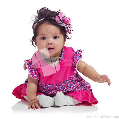 Image of Cute, happy and portrait of a baby girl sitting isolated on a white background in a studio. Girly, playful and innocent, adorable and small child smiling with happiness on a studio background