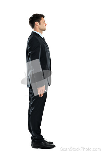 Image of Serious, successful and young businessman standing isolated on a white background in a studio. Side profile, confident and office worker in a suit for work on a studio background with mockup space