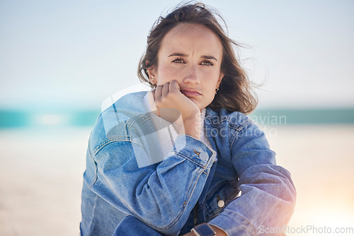 Image of Mental health, woman and thinking on beach, depression and sad with financial crisis, problems or issue. Female, girl and mindset with anxiety, peace or calm on seaside vacation, frustrated or travel