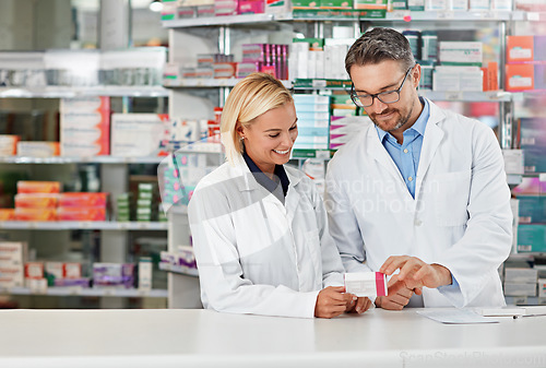 Image of Pharmacy, medicine and pharmacist people for stock check, reading label and healthcare inventory. Product shelf, pills or tablet box and medical expert advice to retail worker, teamwork and help desk