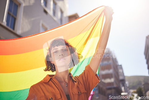 Image of Portrait, pride and woman in city with flag for lgbtq community, ally or lesbian with support and equality in love outdoor. Rainbow, parade and lgbt awareness, inclusion and celebrate with sexuality