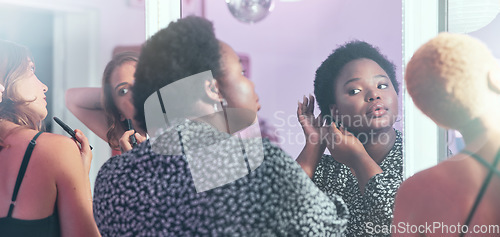 Image of Black woman, night out and girls in bathroom, ready for party and evening out for dancing, bonding and fun. Ladies, females and friends fixing hair, makeup and outfit for club, beauty and happiness