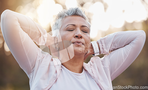 Image of Senior woman, breathing and stretching arms outdoor for fitness exercise, runner warm up and workout training. Nature forest, elderly athlete and closed eyes for performance, breathe and body stretch