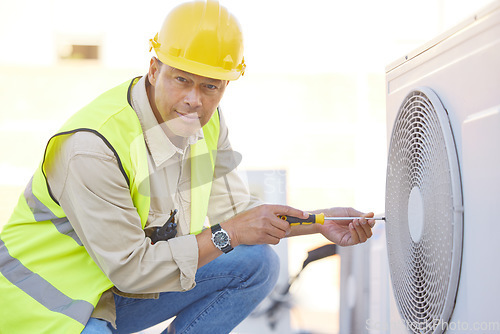 Image of Air conditioner, repair and portrait of man on roof for maintenance, construction and fixing appliance. Ac repair, construction and handyman, technician or engineer with tools for building project