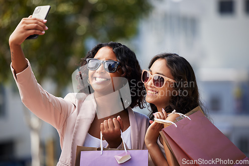 Image of Shopping, selfie and sunglasses of friends or women sales, promotion or discount with finance, wealth or commerce lifestyle. Social media, smartphone and fashion influencer people or customer in city