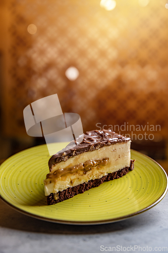 Image of Caramel cheesecake with chocolate topping