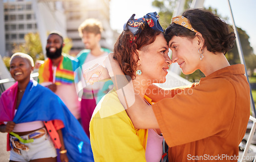 Image of Pride, lesbian couple and march for lgbtq community, queer and young people in city, outdoor or protest. Love, women and friends in town, relationship or happiness for human rights, freedom and smile