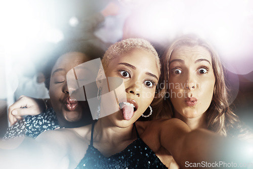 Image of Selfie, party and disco women or friends in nightclub for celebration, social media and fashion event. Influencer people or black woman with funny, crazy and emoji face for portrait in night glitter