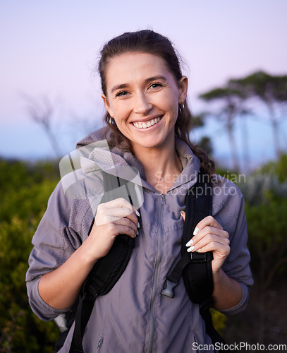 Image of Nature, freedom and portrait of woman hiking in forrest on happy holiday adventure time in Brazil. Travel, wellness and fresh air, hiker trekking in beautiful park landscape with smile and backpack.