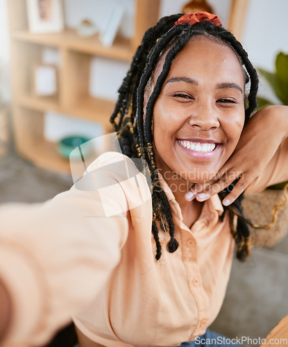 Image of Selfie, smile and portrait of a beautiful woman relaxing, calm and content in a house. Happy, cute and face of a girl with a photo pose for happiness, confidence and empowerment in the morning