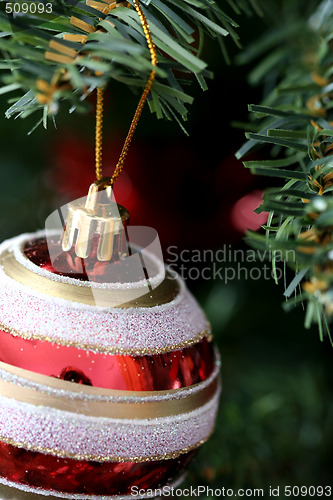 Image of Christmas ornaments on tree.