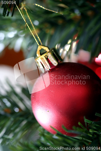 Image of Christmas ornaments on tree.