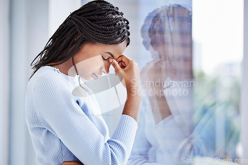 Image of Mental health, window and black woman with depression, thinking and stress in home. African American female, girl and headache for financial crisis, burnout and anxiety for problems, glass and sad