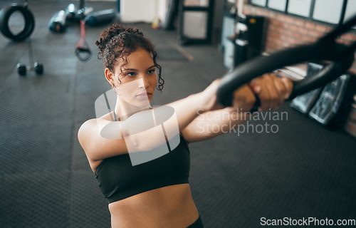 Image of Fitness woman, gymnast ring and woman doing exercise workout, strength training and body wellness routine. Strong sports female or athlete with dip rings for power, self care and a healthy lifestyle