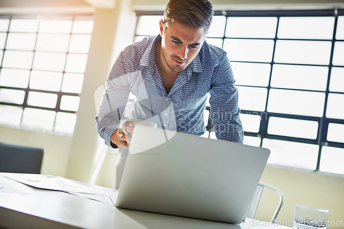 Image of Business man, laptop and information technology with system upgrade, coding at desk and internet . Corporate IT employee, ux with software development and connectivity, wifi and tech with programming