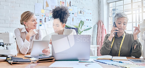 Image of Fashion, designer and teamwork of women with tablet and laptop in workshop. Group collaboration, small business and senior female tailor in boutique on phone call, chatting and networking on mobile.